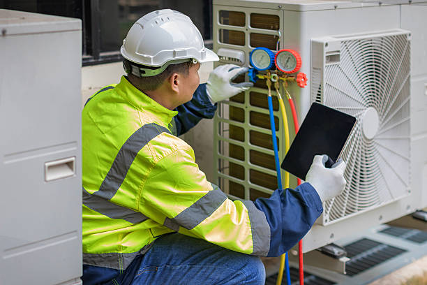 Professional Air Duct Cleaning technician working in Layton, UT